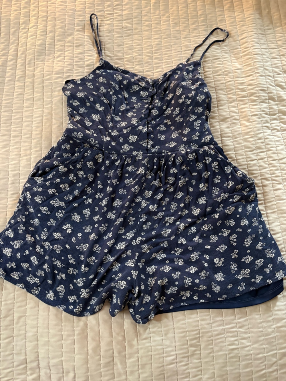 One Clothing Los Angeles Navy Floral Mini Romper with Spaghetti Straps